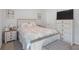 Charming bedroom with neutral colors, decorative bedding, and matching nightstands at 115 Haven Brook Way, Douglasville, GA 30134