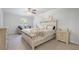 Bright bedroom features large window, comfortable bed, and neutral décor at 115 Haven Brook Way, Douglasville, GA 30134