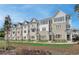 Charming townhome exteriors feature a combination of brick and siding, complemented by manicured landscaping at 3350 Cranston Ln, Kennesaw, GA 30144