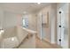 Upstairs hallway with doors leading to rooms, and a stair case at 3350 Cranston Ln, Kennesaw, GA 30144