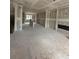 Spacious room under construction featuring unfinished drywall, a fireplace, and ample natural light at 3350 Cranston Ln, Kennesaw, GA 30144