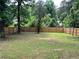 Large backyard with a modern wooden fence and a lush lawn, perfect for relaxing at 3640 Narron Dr, Atlanta, GA 30331