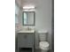 Bathroom featuring a vanity with a mirror, a toilet, and tile walls at 3640 Narron Dr, Atlanta, GA 30331