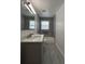 Bathroom features new tile shower, modern vanity and sink, and new flooring at 3640 Narron Dr, Atlanta, GA 30331