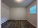 Bright bedroom with stylish wood-look floors and a large closet at 3640 Narron Dr, Atlanta, GA 30331