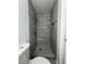 Shower with neutral tile, a shower head, and a built-in niche at 3640 Narron Dr, Atlanta, GA 30331