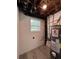 Utility room with modern water heater and a window, offering natural light in the home at 3640 Narron Dr, Atlanta, GA 30331