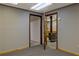 Basement featuring an interesting vintage stove behind an open doorway at 4950 Creel Rd, Chattahoochee Hills, GA 30213