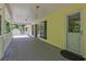 This covered porch offers an additional entry and outdoor living space at 4950 Creel Rd, Chattahoochee Hills, GA 30213