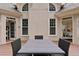 Outdoor dining on a wooden deck with access to different rooms at 5105 Deerlake Dr, Alpharetta, GA 30005