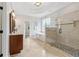 This bathroom features a double vanity, soaking tub, and stand alone shower at 5105 Deerlake Dr, Alpharetta, GA 30005