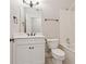 Bathroom with white vanity, neutral decor, and tub with shower at 5105 Deerlake Dr, Alpharetta, GA 30005