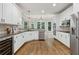 A spacious kitchen with stainless steel appliances, designed for both cooking and entertaining at 5105 Deerlake Dr, Alpharetta, GA 30005