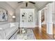 Cozy living room features hardwood floors, built-in shelving, a vaulted ceiling, and comfortable seating at 5105 Deerlake Dr, Alpharetta, GA 30005