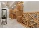 Spacious wine cellar with custom wood racks and tile flooring, perfect for storing a large collection at 5105 Deerlake Dr, Alpharetta, GA 30005