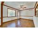 Inviting living room with hardwood floors, natural light, and fresh paint at 606 Evergreen Dr, Woodstock, GA 30188