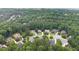 Stunning aerial view of the neighborhood featuring lush greenery and well-maintained homes at 161 Highgrove Dr, Suwanee, GA 30024