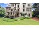 Exterior backyard showing the deck and stairs and a well-maintained garden at 161 Highgrove Dr, Suwanee, GA 30024