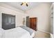 Bedroom with vaulted ceilings, and closet with shelving at 161 Highgrove Dr, Suwanee, GA 30024