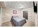 Bedroom with wainscoting, comfortable bed, and closet space at 161 Highgrove Dr, Suwanee, GA 30024
