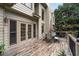 Elegant deck with outdoor dining, providing a seamless transition between indoor and outdoor living spaces at 161 Highgrove Dr, Suwanee, GA 30024