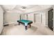 Open game room featuring a billiard table and access to other areas at 161 Highgrove Dr, Suwanee, GA 30024