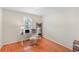 This is a home office or study room with wood floors, a desk, and a computer setup at 2565 Holcomb Springs Dr, Alpharetta, GA 30022