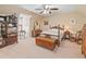 Bedroom with a cozy ambiance, featuring antique furniture and comfortable carpet flooring at 425 Chadwick Pl, Canton, GA 30114