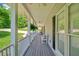 Spacious wraparound porch with comfortable seating, offering a relaxing outdoor space at 425 Chadwick Pl, Canton, GA 30114