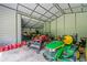 Spacious garage featuring ample storage for tools and equipment, with a high ceiling at 425 Chadwick Pl, Canton, GA 30114