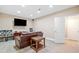Inviting living room with a cozy sofa, television, and ample space for relaxation at 425 Chadwick Pl, Canton, GA 30114