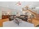 Spacious living room featuring high ceilings, hardwood floors, plenty of seating, and natural light at 425 Chadwick Pl, Canton, GA 30114