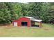 Barn with an open bay and a shed roof overhang offers versatile outdoor storage options at 425 Chadwick Pl, Canton, GA 30114