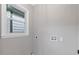 Laundry room with window at 679 Creek View Dr, Lawrenceville, GA 30044