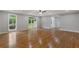 Bright living room features hardwood flooring and recessed lights at 679 Creek View Dr, Lawrenceville, GA 30044