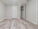 Finished room featuring laminate flooring, a white door, and closet at 2172 Se Wakita Se Dr, Marietta, GA 30060