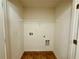 A laundry room features an installed wire rack for storage at 3389 Rosecliff Trce, Buford, GA 30519
