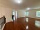 The living room features hardwood flooring, natural light, and neutral paint at 3389 Rosecliff Trce, Buford, GA 30519