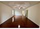 Spacious main bedroom featuring hardwood flooring, recessed lighting, and plenty of natural light at 3389 Rosecliff Trce, Buford, GA 30519