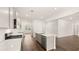 Bright kitchen with white cabinets, stainless steel appliances, and a functional center island at 625 Kimberwick Dr, Locust Grove, GA 30248
