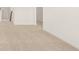 Spacious living room with beige carpet, white walls, and neutral tones at 625 Kimberwick Dr, Locust Grove, GA 30248