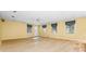 Finished basement with neutral walls, recessed lighting, and exterior access door at 2610 Chadwick Rd, Marietta, GA 30066