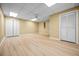 Finished basement featuring wood-look floors, a ceiling fan, and multiple closets at 2610 Chadwick Rd, Marietta, GA 30066