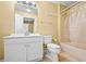 Traditional bathroom features a single sink vanity and a shower tub with a clear curtain at 2610 Chadwick Rd, Marietta, GA 30066