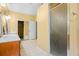 Bathroom featuring double sinks, a closet, a shower with glass door, and a vanity at 2610 Chadwick Rd, Marietta, GA 30066