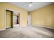 Bedroom features a large closet, neutral walls, and plush carpeting at 2610 Chadwick Rd, Marietta, GA 30066