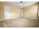 Bedroom features neutral walls, plush carpet, and an access door at 2610 Chadwick Rd, Marietta, GA 30066