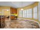 Bright breakfast nook featuring custom cabinets, a built-in desk, and natural light from shuttered windows at 2610 Chadwick Rd, Marietta, GA 30066