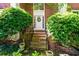 Inviting front porch with brick steps and lush green plants at 2610 Chadwick Rd, Marietta, GA 30066