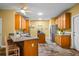Beautiful kitchen features a breakfast bar, oak cabinets, tile floors, and stainless steel appliances at 2610 Chadwick Rd, Marietta, GA 30066